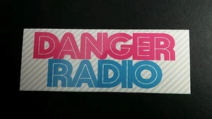 DANGER RADIO PUNCH YOUR LIGHTS OUT PINK BLUE GREY MUSIC 1985 1.5x4 STICKER - Picture 1 of 2