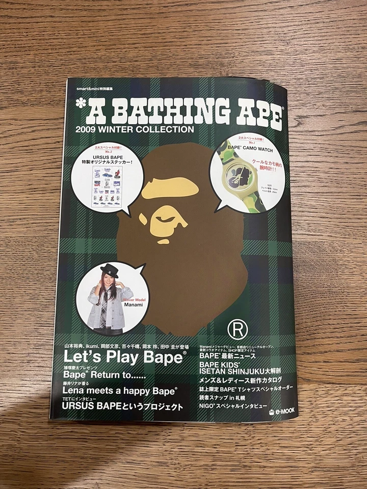 *A BATHING APE 2009 WINTER COLLECTION e-MOOK MAGAZINE WITH WATCH AND STICKER CIB - Image 1 of 4