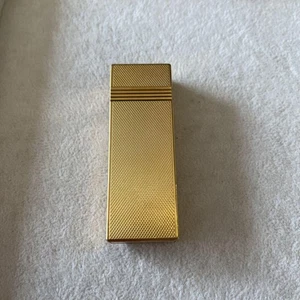 Cartier FeuerzeuggehÀuse Gold Textur - Bild 1 von 3