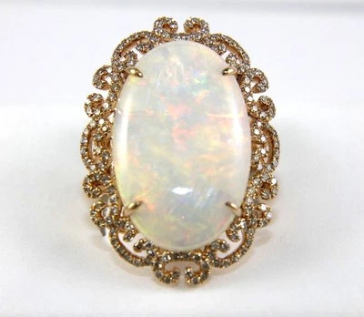 Anillo solitario con halo de diamantes y ópalo de fuego ovalado natural de oro rosa de 14 k de 12,46 quilates Foto 1 de 4