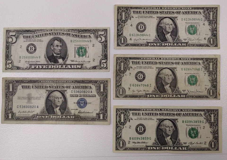 1969 $5 bill 1977 one dollar bill 1957 silver blue seal note 1981 $1 1993 - Image 1 of 4