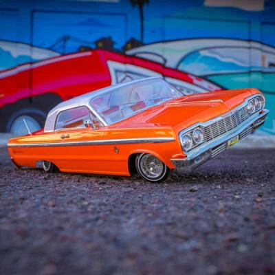 REDCAT SIXTYFOUR RTR RC LOWRIDER CAR 1:10 1964 CHEVY IMPALA HOPPING Orange/White - Image 1 of 4