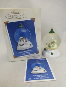 2002 BRINGING HOME THE TREE Winter Wonderland Hallmark Keepsake Ornament w/card - Picture 1 of 7