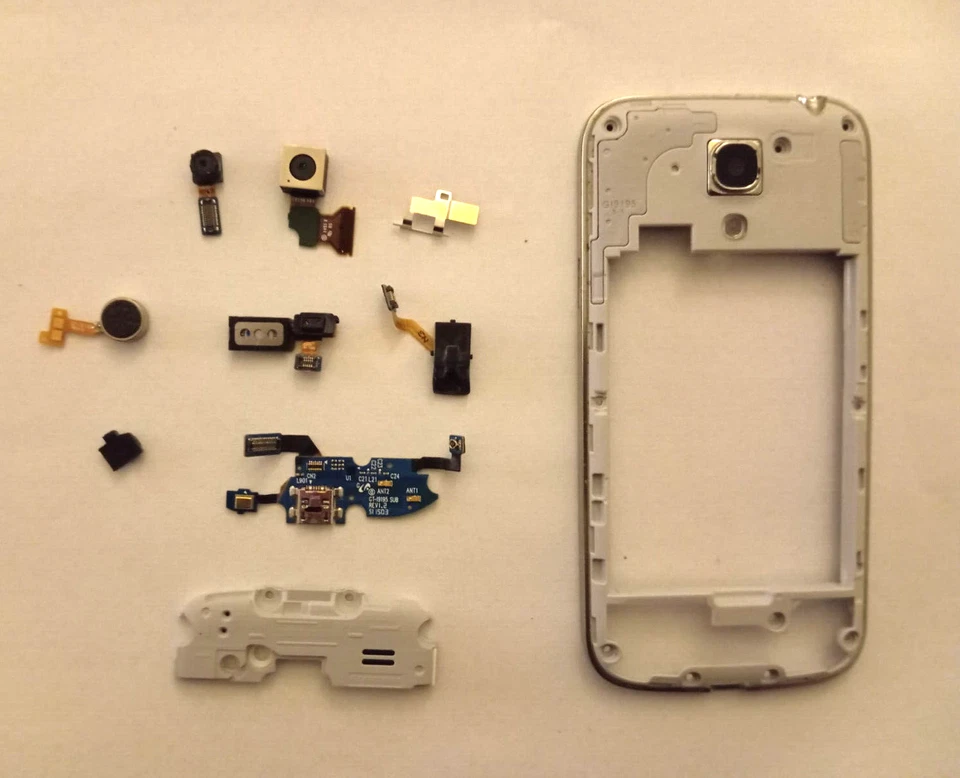 SAMSUNG GALAXY S4 GT-i9505 KIT COVER FRAME CAMERA USB SPEAKER ETC ORIGINALE - Imagen 1 de 1