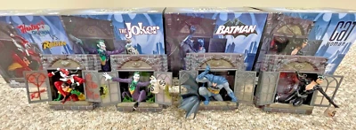 Juego completo de 4 estatuas de escultura de pared DC Direct Batman Gotham City Stories Foto 1 de 4