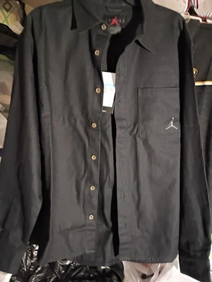 Camisa Air Jordan Essentials con botones para hombre mediana negra manga larga FV7446 010 Foto 1 de 4