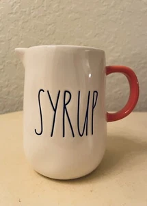 Rae Dunn Ceramic “SYRUP “ Small Pitcher With Orange Handle - Picture 1 of 2