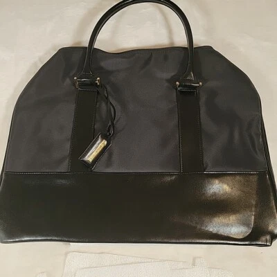 Bolso de viaje grande Estee Lauder negro con doble asa Foto 1 de 4