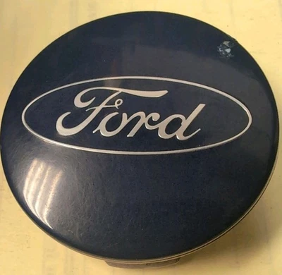 TAPA CENTRAL FORD FUSION FOCUS FIESTA ESCAPE EDGE OEM 6M21-1003-AA (1 PIEZA) Foto 1 de 4