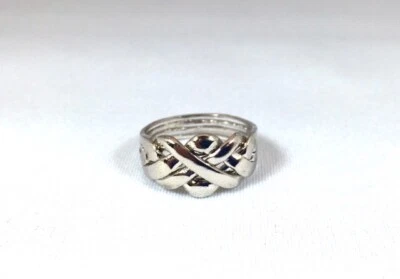puzzle ring sterling silver four piece size 3 to 12. - Image 1 of 4