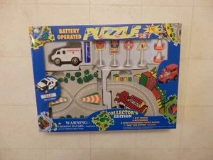 BATTERIEBETRIEBENER KRANKENWAGEN 16-TEILIGES PUZZLE-SET COLLECTOR'S EDITION NEU IM KARTON - Bild 1 von 1