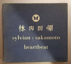 David Sylvian & Ryuichi Sakamoto - Heartbeat (Pappkarton) - Picture 1 of 10
