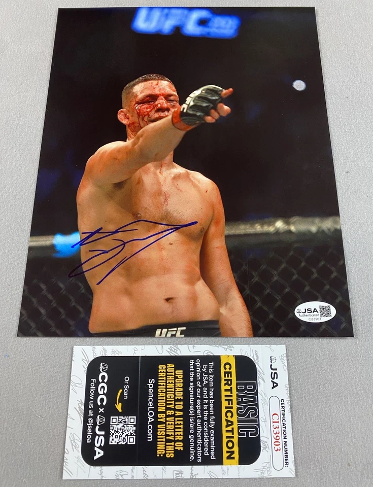 UFC STAR- NATE DIAZ AUTOGRAPH 8x10 FIGHT BLOOD ACTION PHOTO UFC/MMA JSA CI33903 - Image 1 of 1