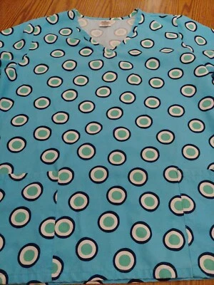 Blusa Médica Mediana Sin Marca!! Usado en excelente estado!! Azul Neptuno con círculos Foto 1 de 4
