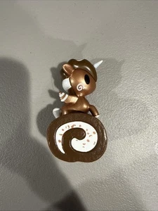 TOKIDOKI UNICORNO DELICIOSA SERIE 1 CHOCO ROLL CAZADOR FIGURA SIN CAJA - Imagen 1 de 1