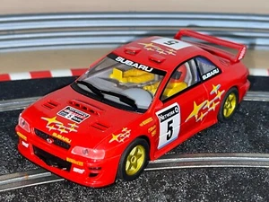 1216- Scalextric Hornby Subaru Impreza WRC #5 Network Q Rally slot car 1:32 scx - Imagen 1 de 3