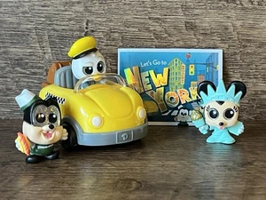 Disney Doorables Let's Go New York Figuren mit Fahrzeug Minnie Freiheitsstatue - Bild 1 von 13