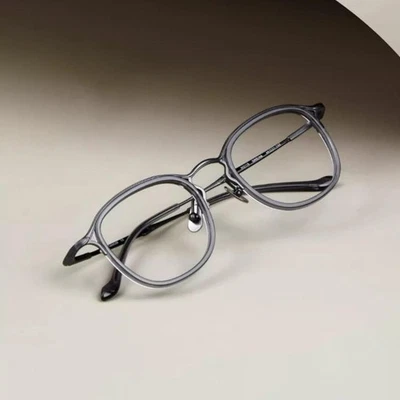 Marco de gafas retro ovalado gafas de titanio puro borde completo gafas hombres mujeres Foto 1 de 4