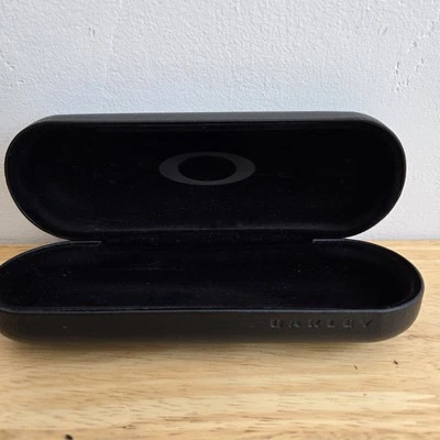 OAKLEY NEGRO PEQUEÑO AUTÉNTICO CLAMSHELL GAFAS ESTUCHE RÍGIDO Foto 1 de 4