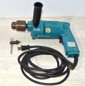 Makita kabelgebundener Bohrhammer 1/2" 2 Geschwindigkeiten Bohrfutter Schlüsselgriff 6302 funktioniert - Bild 1 von 9