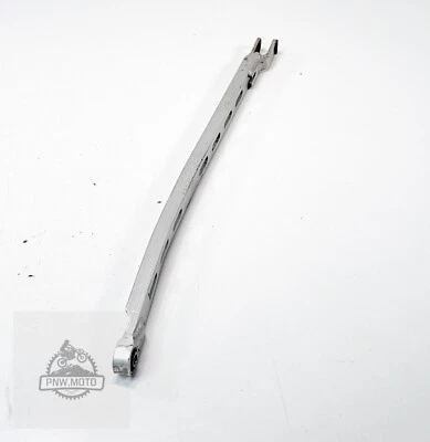 Honda CR250R CR 250R 125R 1986 OEM brazo de tope de varilla de freno trasero Foto 1 de 4