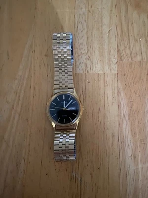 Reloj Hombre Cuarzo Vintage Pulsar V533-8B50 Día/Fecha.  Azul, dorado y plateado.  Foto 1 de 4