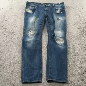 Guess Jeans Mens 33x32 Dylan Tapered Button Fly Distressed Blue Thrashed Rocker - Picture 1 of 16