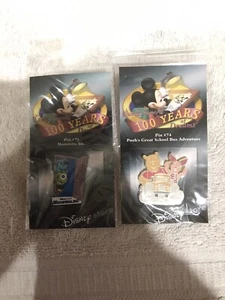Disney 100 YEARS OF DREAMS - 2 Pin Lot #74 Pooh School Bus & #71 Monsters Inc. - Picture 1 of 3