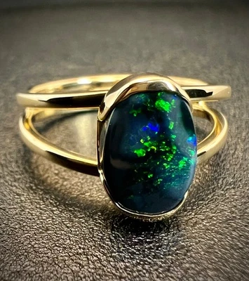 Anillo de boda ovalado de ópalo negro Welo etíope natural de oro macizo de 14k de primera calidad Foto 1 de 3