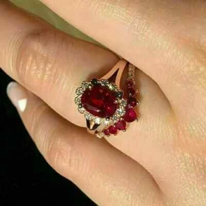 3.22Ct Oval Cut Lab Created Red Ruby Halo Bridal Set 14k Rose Gold Plated Ring - Picture 1 of 6