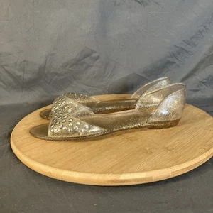 Zapatos planos Jimmy Choo JILL para mujer 7/38 dorado brillo tachonado transparente PVC gelatina - Imagen 1 de 11