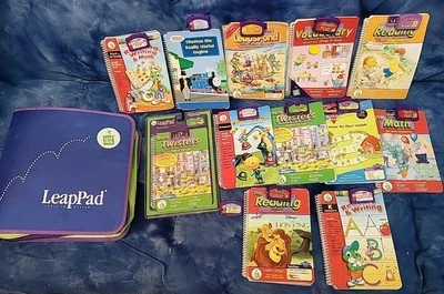 LeapFrog LeapPad Learning System 13 Games Cartridges 12 Books  - With Case Lot - Image 1 of 4