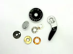 Canon AE-1 Film Advance Lever Crank & Shutter Speed Dial Assembly - Silver - Foto 1 di 1