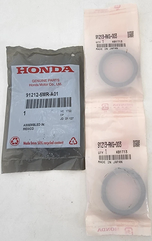 Juego de dos sellos de árbol de levas y sello de cigüeñal delantero genuino Honda Foto 1 de 1