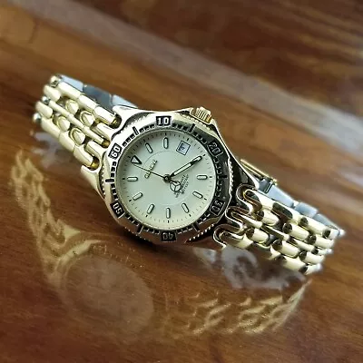 Reloj de buceo GENEVE Swiss SEL chapado en oro de 18 quilates 660' WR Foto 1 de 4