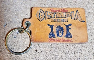 Vintage "OLYMPIA BEER" "It's in the Water"...Real Leather Keychain - Picture 1 of 2