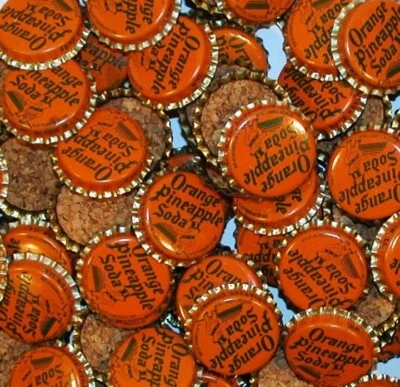 Soda pop bottle caps Lot of 12 DUKE ORANGE PINEAPPLE baby pictured new old stock - Image 1 of 2