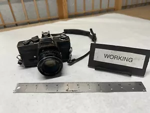 Fotocamera Minolta SRT 102 con obiettivo Rokkor-X 50mm 1.7 NERA FUNZIONANTE! - Foto 1 di 9