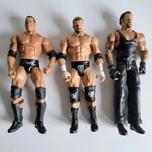 3 WWE Mattel 2011 The Rock Elite Triple H Undertaker Wrestling Actionfiguren - Bild 1 von 12