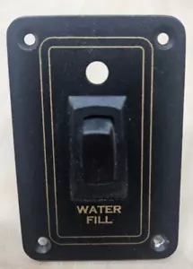 MOMENTARY SWITCH W/ LED WATER FILL BLACK W/ GOLD TRIM AND LETTERING 2000108 - Picture 1 of 3