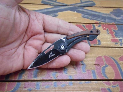 Gerber Trendy Pocket Knife Frame Lock Plain Edge Blade Money Clip - Image 1 of 4