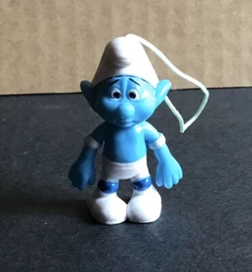 LES SCHTROUMPFS Figurine PVC Schtroumpf froussard 4 cm Peyo 2011 Delhaize TBE - Imagen 1 de 2