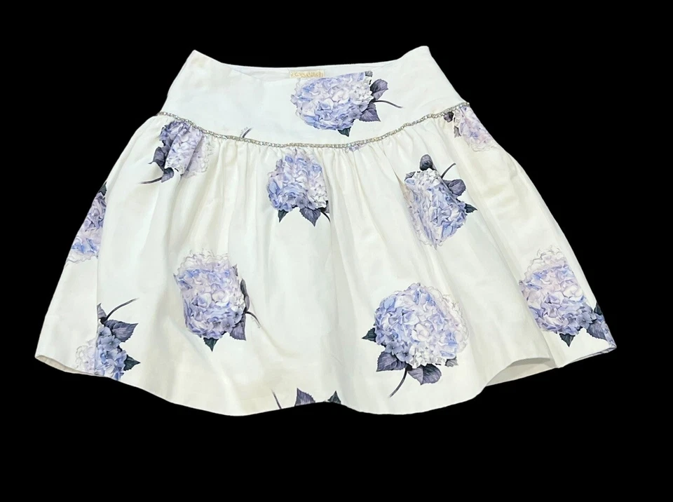 FALDA ACAMPANADA MONNALISA NIÑA BLANCA MORADA FLORES FLORES ESTRÁS TALLA 12-14 Foto 1 de 4