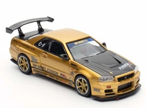 NISSAN Skyline GT-R (R34) Top Secret  - gold - Inno 1:64 - Foto 1 di 6