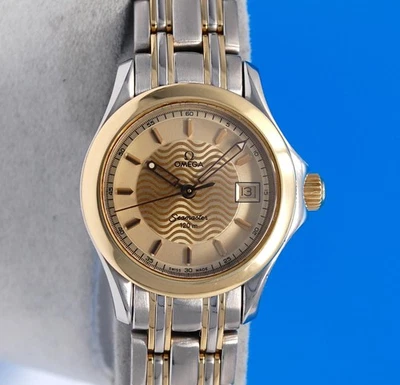 Reloj Omega Seamaster para dama de oro de 18 quilates y SS - esfera dorada - 2381,11 Foto 1 de 4