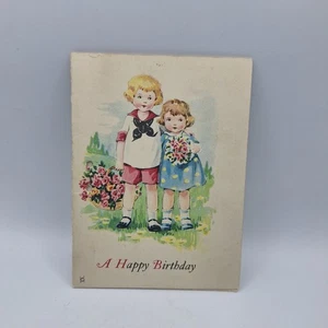 Tarjeta de cumpleaños infantil vintage años 40 niño niña flores "Un feliz cumpleaños" - Imagen 1 de 6