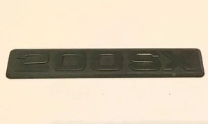 1979-1982 DATSUN 200SX SIDE FENDER EMBLEM LOGO BADGE SYMBOL SIGN OEM Nameplate - Picture 1 of 2