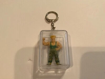 Vintage 1992 CAPCOM Street Fighter II Figurine Keychain Guile Video Game Toy - Image 1 of 3
