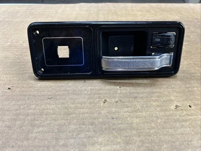 84-96 Jeep Cherokee XJ Passenger Side Rear Door Handle Bezel  OEM - Image 1 of 4