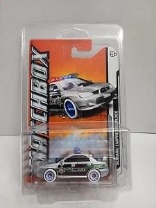 Matchbox - MBX Arctic - Subaru Impreza Police 8/10 W/PROTECTOR - Picture 1 of 7